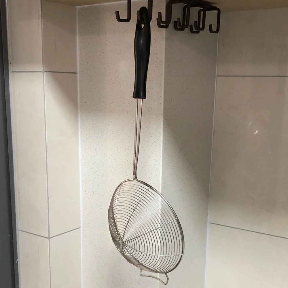 Black-Handled Stainless Steel Skimmer Spoon for Frying and Draining